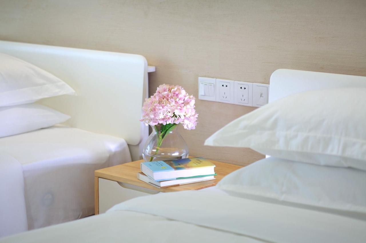 Care Residential Hotel Хайкоу Екстер'єр фото